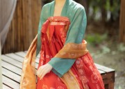 The Evolution of Bilateral Double-Round-Neck Cheongsam:A Blend of Tradition and Modernity