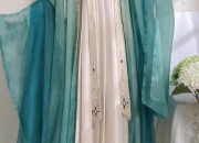 Embracing Modernity in Traditional Style:The Evolution of Chinese Cheongsam into Neo-Classical Chic