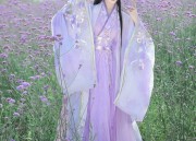 The Charm of Cheongsam with a Jacket:A Fashionable Blend of Traditional and Modern Elements