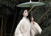 Hand-Stitched Black Cheongsam:An Art of Traditional Elegance