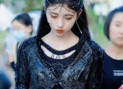 The Elegance of a Hanfu Fan-Wearing Woman