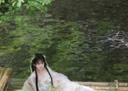 The Elegance of a Long-Style Outer Jacket with a Cheongsam Qipao Pairing