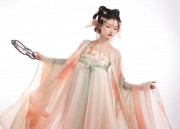 The Enchantment of a Blue Ma-Face Skirt with its Beads,Trains,and Blue Tassel Flows