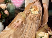 The Enchanting Charm of a Golden Yellow Cheongsam:A Tale of Traditional Elegance