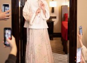 The Elegance of a Fan-Wearing Cheongsam Woman