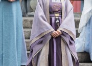 A Purple Horseface Skirt Adorned with a Necklace