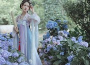 The Elegance of White Qipao with an Aodai Style