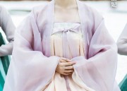 The Enchantment of a Red Cheongsam with Shawl and Jacket