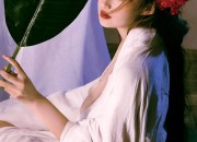 Embracing the New Neo-Chinese Cheongsam with Fake Hair:A Modern Fashion Statement