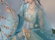 The Enigma of a Blue Cheongsam Woman in a Light Azure Shade