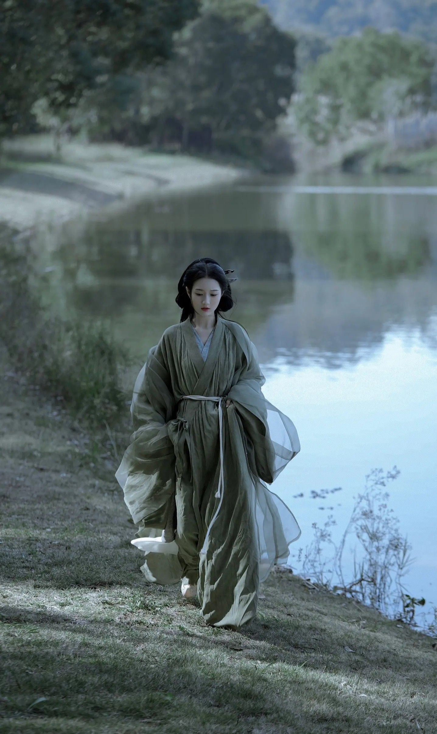 The Enchantment of a Girl Child in Traditional Hanfu with Water-Sleeved Splendor The Enchantment of a Girl Child in Traditional Hanfu with Water-Sleeved Splendor