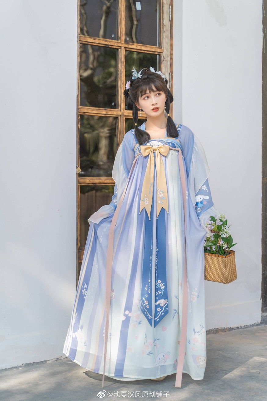 The Enchanting Pink Tang Suit:A Cultural Icon of Chinese Elegance