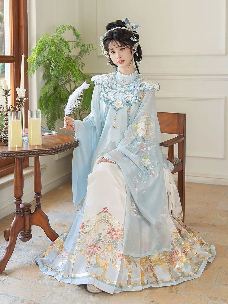 The Enchantment of Ten-Fold Pleated Skirt with Horse-Face Motifs