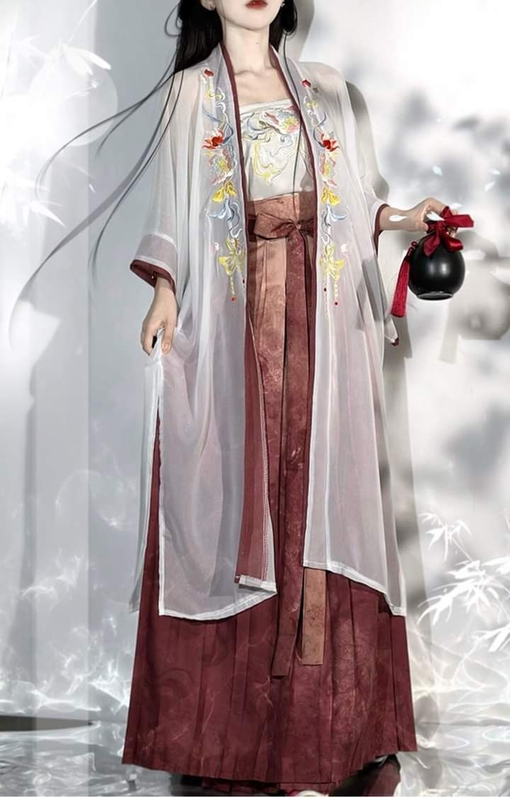 Traditional Charm of Qiyue Elegance:National Style Cheongsam and Its Cultural Significance Traditional Charm of Qiyue Elegance:National Style Cheongsam and Its Cultural Significance