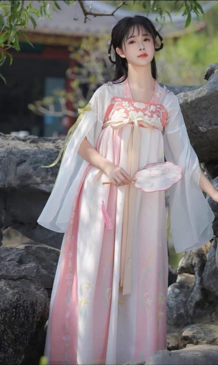 Apricot-Colored Innovations in Traditional Cheongsam Design