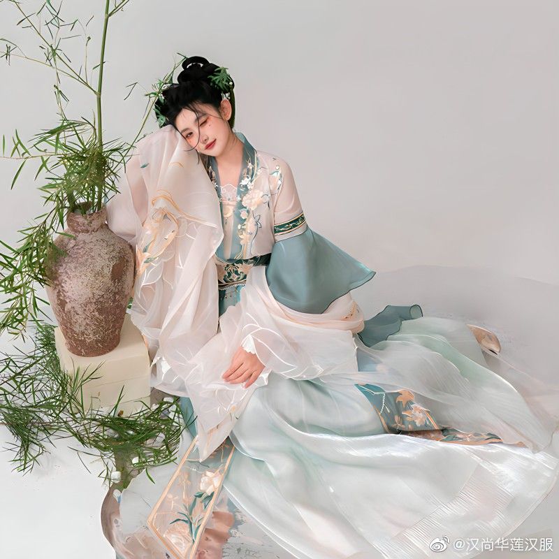 Classic Charm of Cheongsam and Cardigan:A Two-Piece Ensemble Classic Charm of Cheongsam and Cardigan:A Two-Piece Ensemble