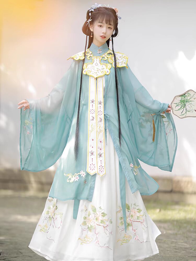 The Rise of Cheongsam-Inspired Cardigans:A Blend of Traditional Elegance and Modern Comfort The Rise of Cheongsam-Inspired Cardigans:A Blend of Traditional Elegance and Modern Comfort