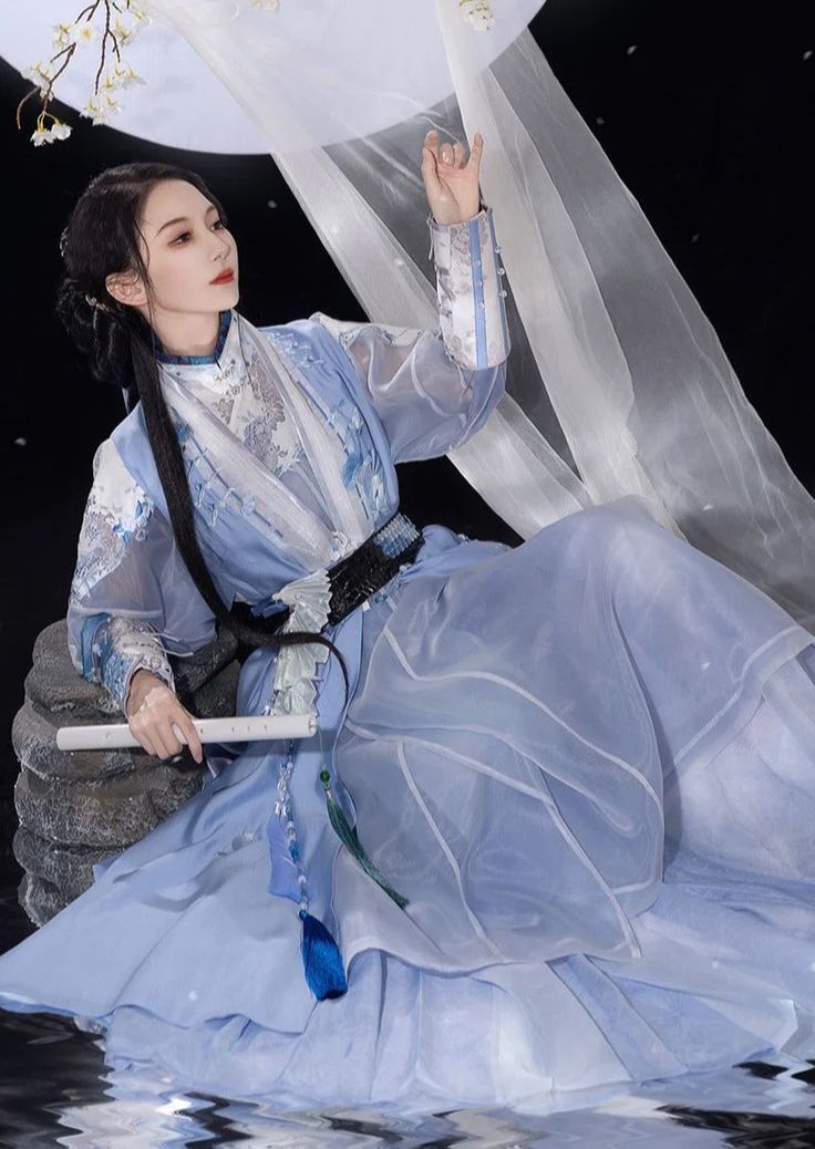 The Enchantment of a Black Cheongsam and a Blue Butterfly The Enchantment of a Black Cheongsam and a Blue Butterfly